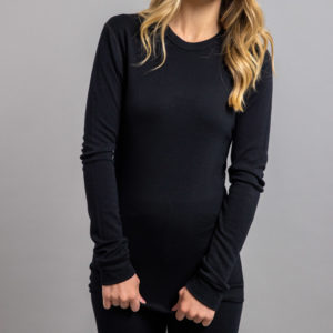 Front view of a female wearing black Merino Skins – Unisex Long Sleeve Crew Neck