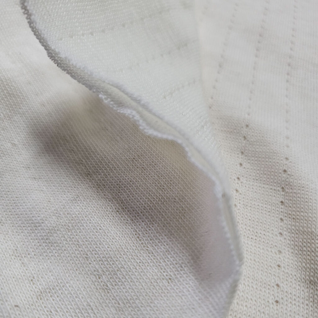 Thermo Fleece Sensitive - fabric showing cotton and Merino wool layer